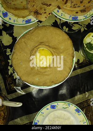 desi spicy food from Pakistan and India presentation in traditional pots Stock Photo