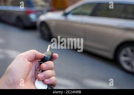 Hand holding car key Stock Photo