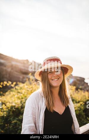 Smiling woman wearing hat Stock Photo