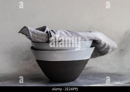 Napkins on two ceramic bowls Stock Photo