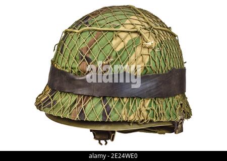 Vintage World War Two soldier helmet with camouflage isolated on a white background Stock Photo