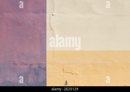 Pink and yellow painted wall, abstract background or texture Stock Photo