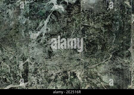 Dark green marble tile grunge background or texture Stock Photo