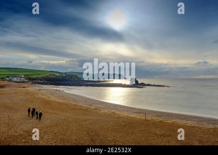 An atmospheric winter's afternoon view of the sea from above the beach. Thurlestone, South Devon UK Stock Photo