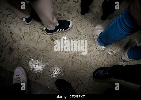 Seoul, Bucheon, South Korea. 12th Jan, 2021. Molten snow soil the floor of a Seoul Line 1 commuter express train Tuesday, Jan. 12, 2021. Credit: Jintak Han/ZUMA Wire/Alamy Live News Stock Photo