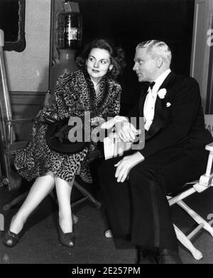 JEANNE CAGNEY on set candid with her brother JAMES CAGNEY made up as old George M. Cohan on set candid during filming of YANKEE DOODLE DANDY 1942 director MICHAEL CURTIZ Warner Bros. Stock Photo