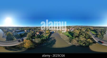 Aylesford, Kent, United Kingdom - November 4th, 2020: View of Aylesford village in Kent, England with medieval bridge and church in autumn tints. Stock Photo