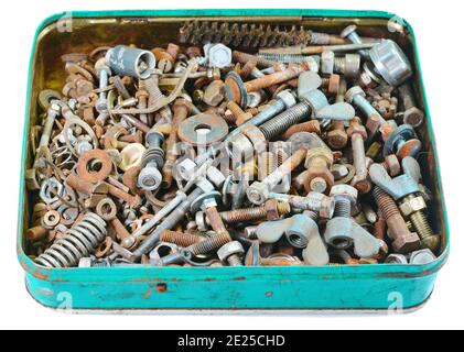 Old rusty bolts, screws, nuts, screws, brackets, various metal details in a metal box. Stock Photo