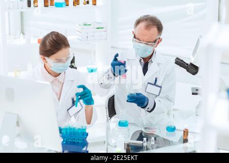 close up. researchers work with tests in the laboratory. Stock Photo