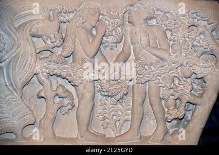 Saint Joseph church.   Capital sculpture. Adam and Eve in Garden of Enden. Stock Photo
