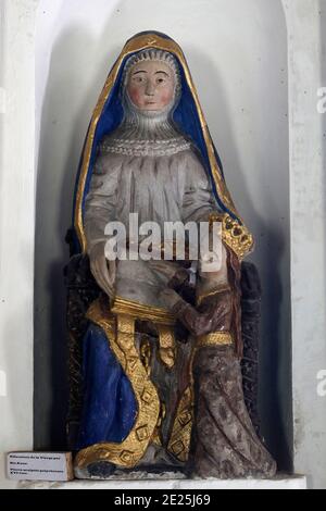 Notre Dame (Our Lady) church, Ajou, France. The Virgin Mary with her mother St. Anne. 16th century statue. Stock Photo