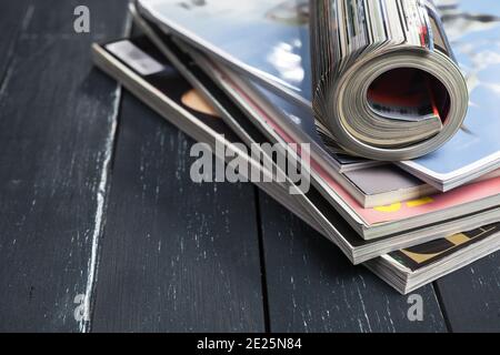 Close up stacking magazine place on table background Stock Photo