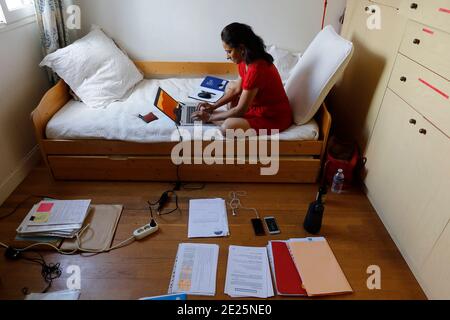Woman working from home in Montrouge, France Stock Photo