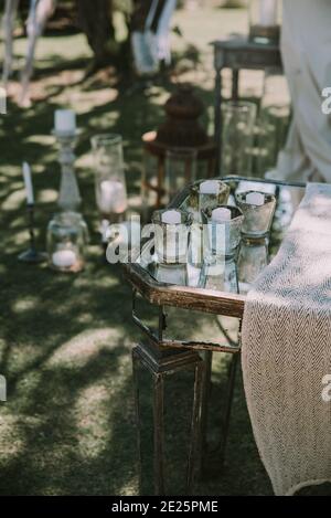 glass table with candles and chairs Stock Photo