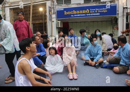 GEORGETOWN, MALAYSIA - Feb 02, 2020: A performance group playing teacher and students at school on a Chinese New Year festival in a street of Georgeto Stock Photo