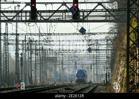 electric train goes on railroad Stock Photo