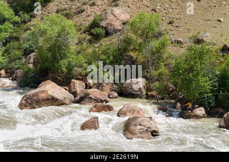 Valley of river Suusamyr in the Tien Shan Mountains.  Asia, central Asia, Kyrgyzstan Stock Photo