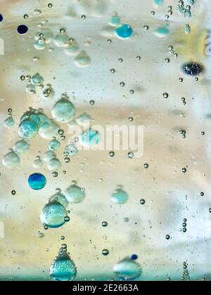 Abstract of colourful bubbles rising through liquid, background patterns Stock Photo