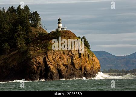 WA19086-00...WASHINGTON - Cape Disappointment Lighthouse guarding the dangerous entrance to the Columbia River in Cape Disappointment State Park. Stock Photo