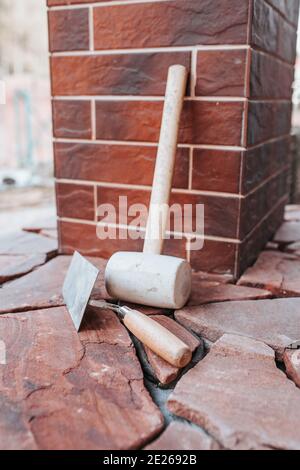 Sandstone floor tiles - granite pieces of different shapes and sizes for decoration Stock Photo