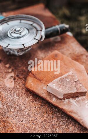 Professional cladding of stone tiles on the facade of the house - natural stone Stock Photo