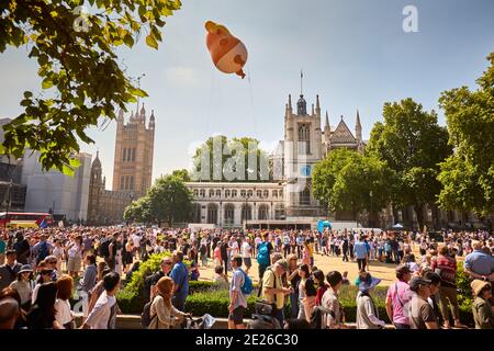 Trump Baby blimp flying in Parliament Square during an official visit by the US President to London Stock Photo