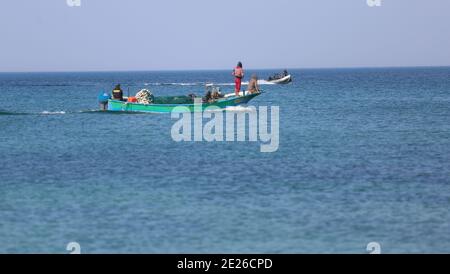 Deir Al-Balah, The Gaza Strip, Palestine. 12th Jan, 2021. Palestinians at Deir al-Balah city beach in the central of the Gaza strip. Credit: Mahmoud Khattab/Quds Net News/ZUMA Wire/Alamy Live News Stock Photo