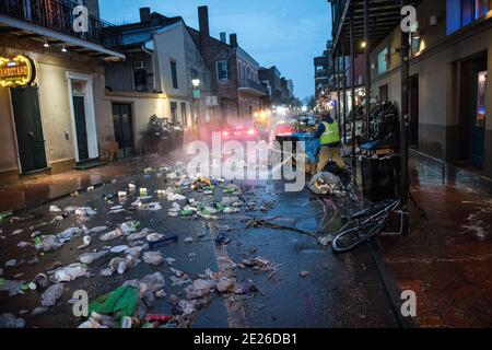 Cleanup after Mardi Gras Parade on St. Charles Avenue in New Orleans, Lousiana, USA. Stock Photo