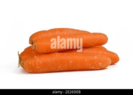 Group of raw fresh carrots isolated on white background Stock Photo