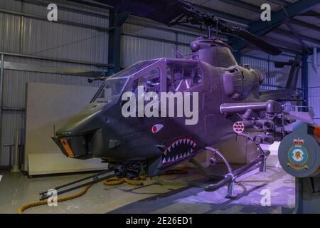 An AH-1F Cobra helicopter on display at the Army Flying Museum, a Military Aviation Museum in Stockbridge, Hampshire, UK. Stock Photo