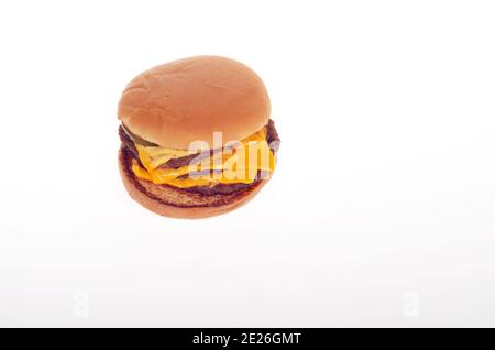 McDonalds Triple Cheeseburger on white background Stock Photo