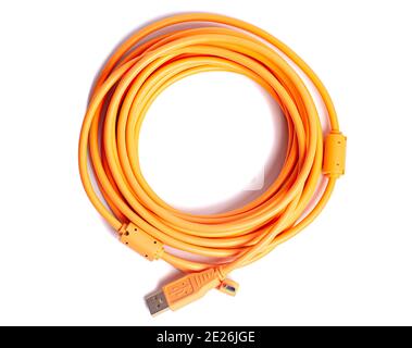 Orange rolled cable isolated on white background. Stock Photo
