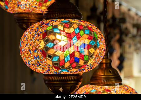 Turkish mosaic lambs. glass  mosaic lamp in grand bazaar. Hand made mosaic vintage lambs close up Stock Photo