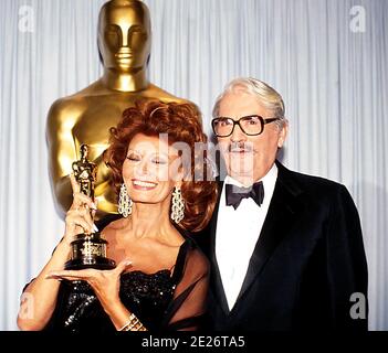 Sophia Loren and Gregory Peck at the 63rd Academy Awards ceremony on ...