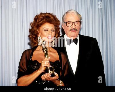 Sophia Loren and Gregory Peck at the 63rd Academy Awards ceremony on ...