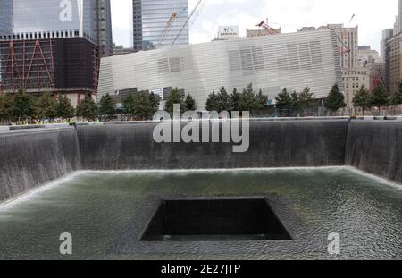 The 9/11 Memorial Pools are tested with water by construction workers during the New York Foreign Press International journalists' visit to Ground Zero, New York City, NY, USA on August 4, 2011. The memorial features two reflecting pools on the footprints of the twin towers. The memorial is scheduled to be dedicated on September 11, 2011, the tenth anniversary of the World Trade Center terrorist attacks. Photo by Luiz Rampelotto/ABACAPRESS.COM Stock Photo
