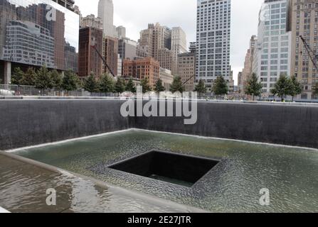The 9/11 Memorial Pools are tested with water by construction workers during the New York Foreign Press International journalists' visit to Ground Zero, New York City, NY, USA on August 4, 2011. The memorial features two reflecting pools on the footprints of the twin towers. The memorial is scheduled to be dedicated on September 11, 2011, the tenth anniversary of the World Trade Center terrorist attacks. Photo by Luiz Rampelotto/ABACAPRESS.COM Stock Photo