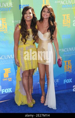 Demi Lovato and Selena Gomez attending the '2011 Teen Choice Awards' held at the Gibson Amphitheater in Universal City, Los Angeles, CA, USA, on August 7, 2011. Photo by Tony DiMaio/ABACAPRESS.COM Stock Photo