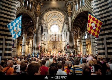 Historical parade inside Siena Cathedral (Duomo di Siena) before Siena Palio race, Siena, Tuscany, Italy Stock Photo