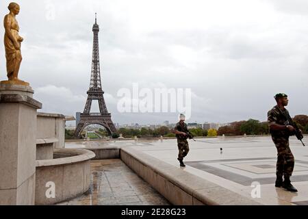 French soldiers patrol near the Eiffel Tower, as 'Vigipirate' (France anti-terror plan) security measures are heightened during a memorial event marking the 10th anniversary of the 9/11 terrorist attacks on the World Trade Center in the US, on Place Trocadero, near the Eiffel Tower in Paris, France on September 11, 2011. Photo by Stephane Lemouton/ABACAPRESS.COM Stock Photo