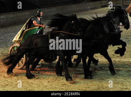 A quadriga rider in action during the 'Ben-Hur Live Show' presentation in Rome, Italy on september 15, 2011. Based on the 1880 novel by Lewis 'Lew' Wallace, the show includes a high-speed chariot race and a dramatic naval battle, among other scenes likely to leave audience members on the edge of their seats.It also features a soundtrack by American musician Stewart Copeland (ex-Police). Photo by Eric Vandeville/ABACAPRESS.COM Stock Photo