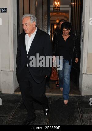 Dominique Strauss-Kahn and his wife Anne Sinclair leaving a building after having lunch with friends in Paris, France on September 18, 2011. Photo by ABACAPRESS.COM Stock Photo