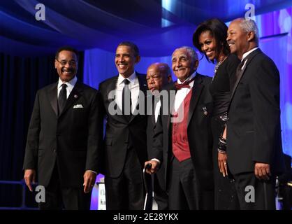 Congressional Black Caucus(CBC) Chairman, Rep. Emanuel Cleaver II(D-MO)(left), U.S. President Barack Obama(second left), Representative John Lewis(D-GA)(third left), Reverend Joseph Lowery(third right), First Lady Michelle Obama((second right) CBC Foundation Chairman Donald Payne(D-NJ)(right) stand for a photo at the conclusion of the Congressional Black Caucus Foundation Annual Phoenix Awards dinner in Washington, USA on September 24, 2011. Photo by Chris Kleponis/ABACAPRESS.COM Stock Photo