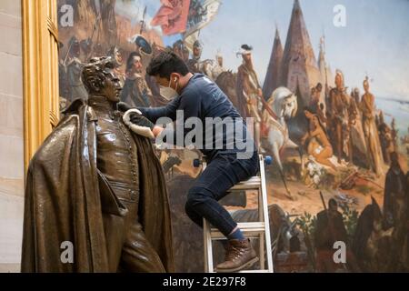 Washington, United States Of America. 12th Jan, 2021. A man works on cleaning up a statue of former President Andrew Jackson in the Rotunda at the U.S. Capitol in Washington, DC, Tuesday, January 12, 2021. Credit: Rod Lamkey/CNP | usage worldwide Credit: dpa/Alamy Live News Stock Photo