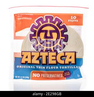 Winneconne, WI -4 January 2021: A package of package of Azteca soft flour tortillas shells on an isolated background. Stock Photo