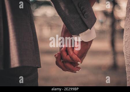 Closeup shot of a couple holding e Stock Photo