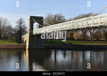 Nottingham, England - January 13, 2021: The arched foundations of Wilford suspension bridge over the River Trent at West Bridgford in Nottingham, Unit Stock Photo