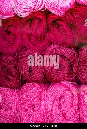 Different shades of pink yarn,  close up. Stock Photo