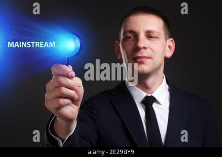 The concept of business, technology, the Internet and the network. A young entrepreneur working on a virtual screen of the future and sees the inscrip Stock Photo