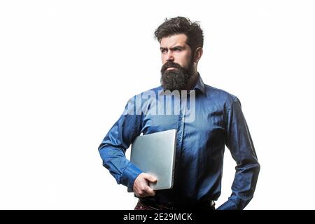 Holding laptop computer. Serious handsome bearded man worker laptop. Bearded male businessman holding a computer in his hands isolated on white Stock Photo